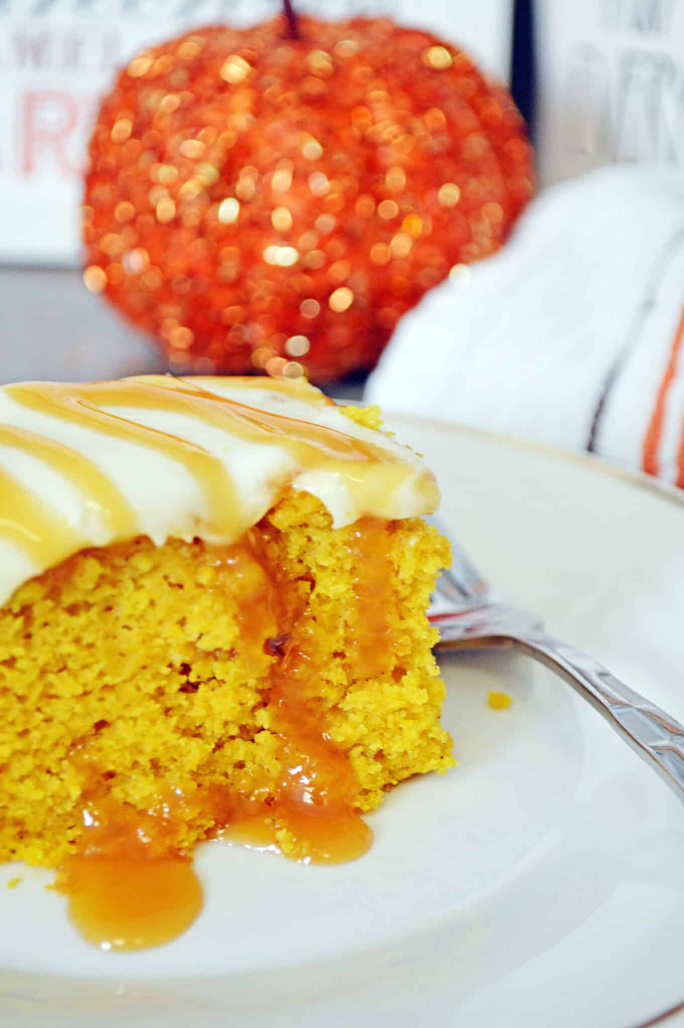 Pumpkin Caramel Poke Cake with Cream Cheese Frosting