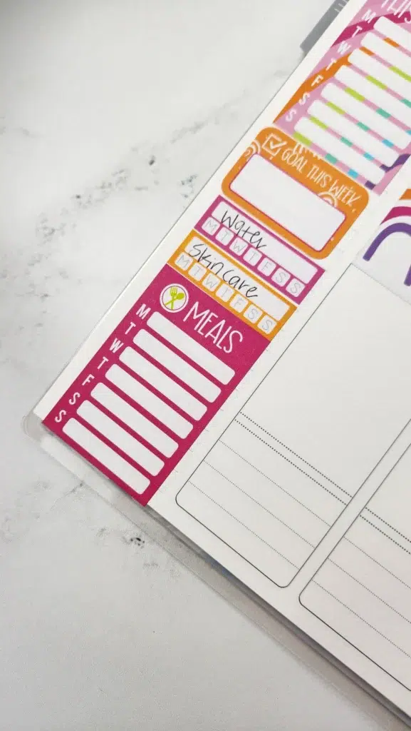 a planner with habit stickers