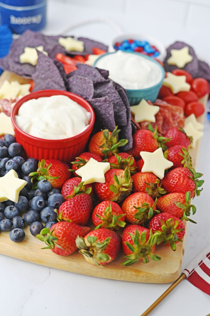 Red white and blue patriotic charcuterie board for Fourth of July parties