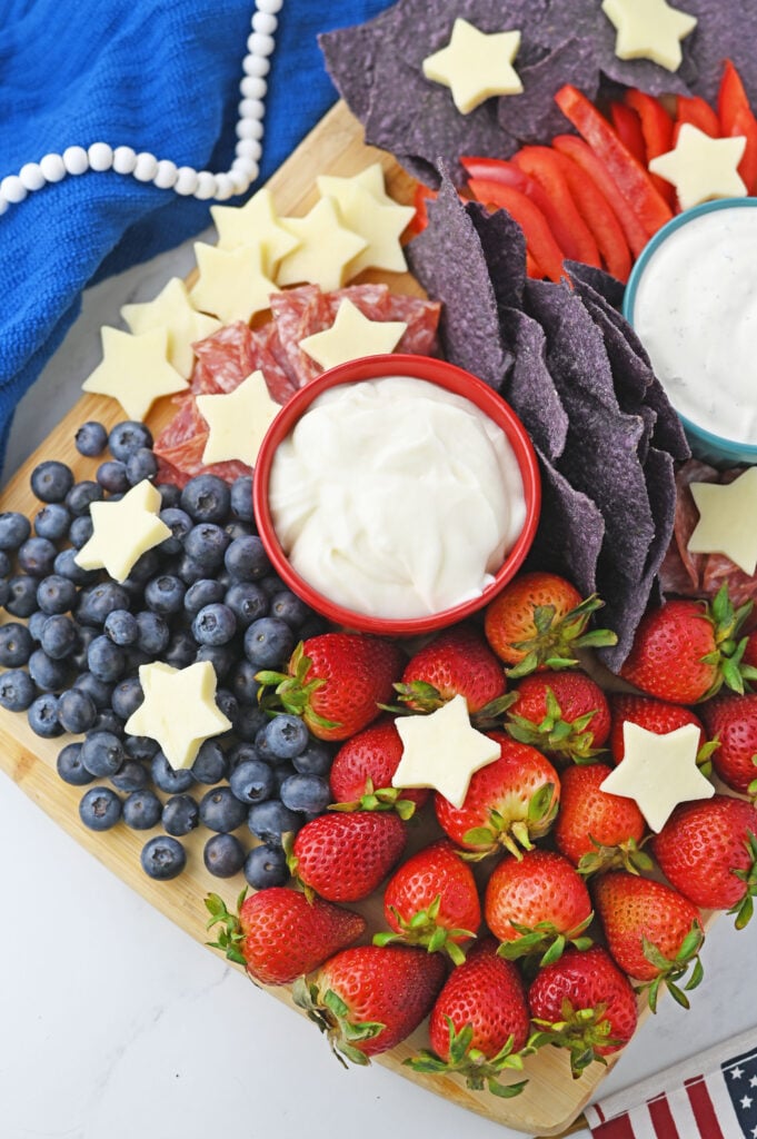 Easy patriotic snack board idea with berries, cheese, and crackers