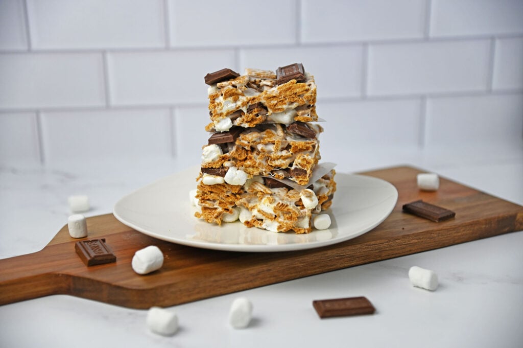 Golden Grahams S'mores Bars stacked on a plate