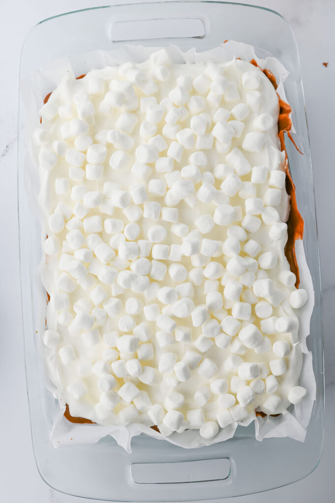 mini marshmallows on top of the hot chocolate lasagna