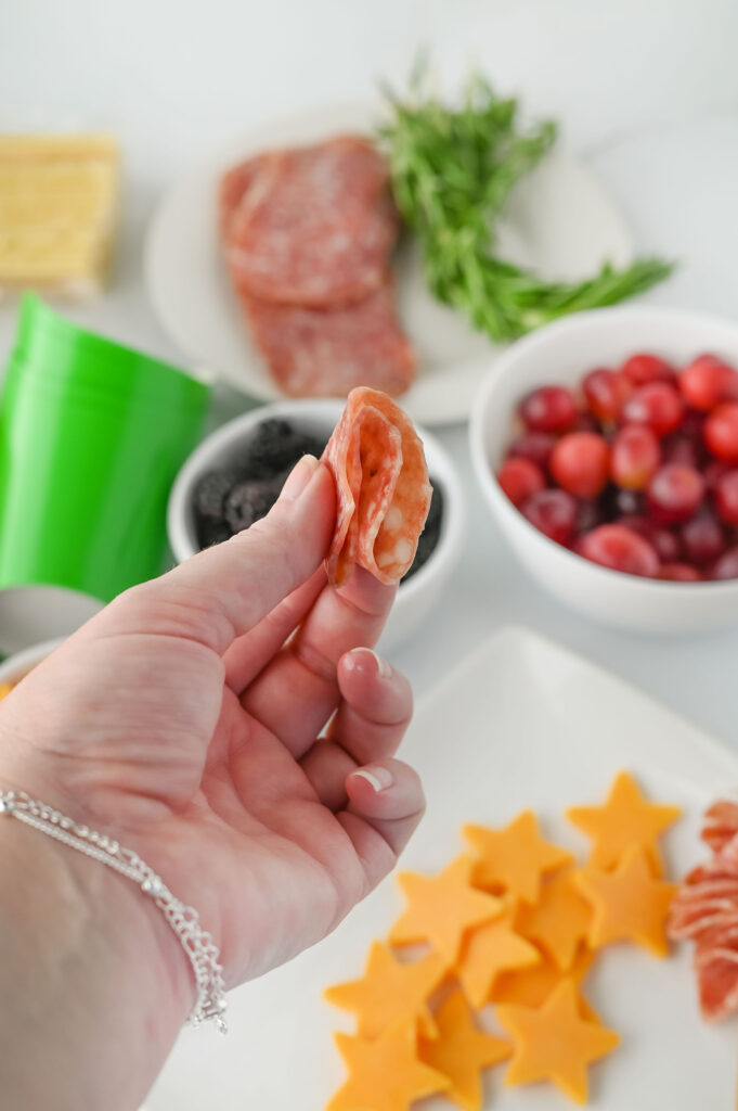 Salami slice folded again into a triangle shape
