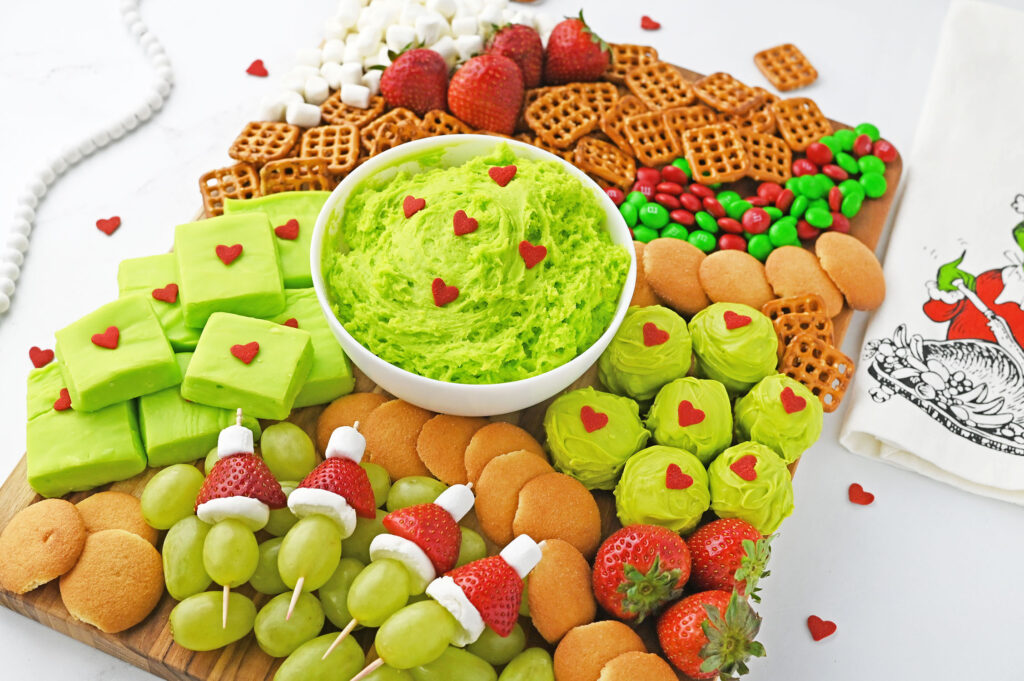 Close-up of Grinch-themed fluff dip in bowl on holiday board