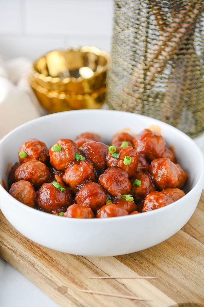 Crockpot cranberry meatballs coated in a sweet and tangy cranberry chili sauce