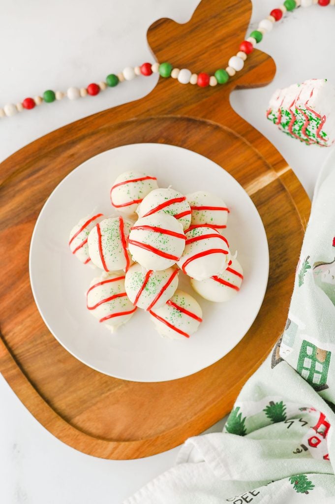 Homemade Christmas Tree Cake Truffles decorated to look like Little Debbie Christmas Tree Cakes.
