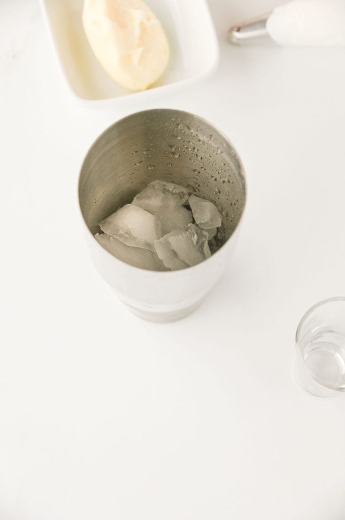 A cocktail shaker with ice.