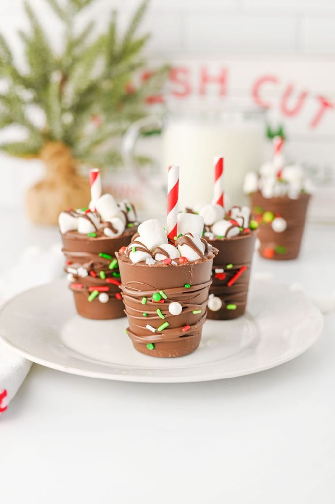 Homemade hot chocolate sticks with mini marshmallows and Christmas sprinkles