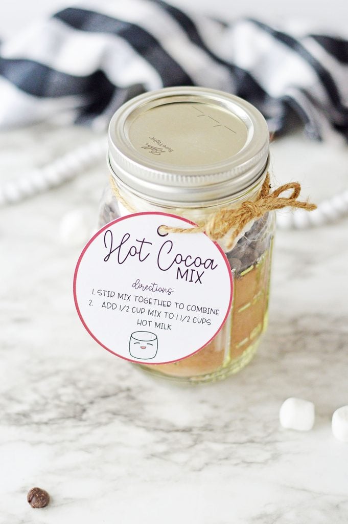 DIY hot chocolate gift jar filled with cocoa mix, chocolate chips, and marshmallows