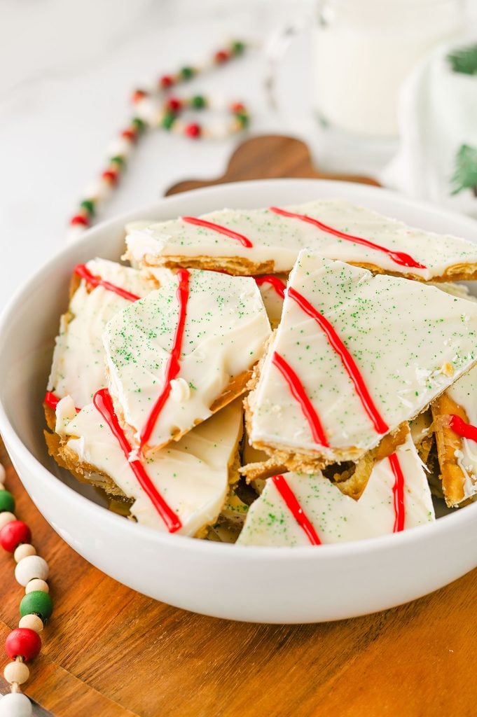 Sweet and salty Christmas crack with layers of crispy crackers, brown sugar toffee, and white chocolate.